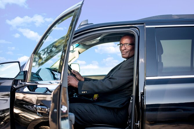 Bahamas Airport Transportation w/Free Grocery Stop-1 Way Private - Meeting your driver at Lynden Pindling Airport