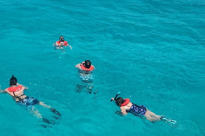 Guided All Inclusive Beach Day Excursion in Bahamas - Timing, transport, and the boarding warning