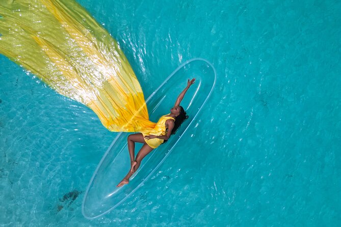Nassau Clear Kayak Drone Photoshoot- Floating Dress - Changing from your outfit into the floating dress