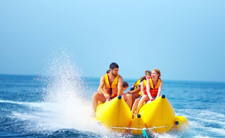 Nassau: Jet Ski Ride, Parasailing & Banana Boat Tour - Getting set up at Cabbage Beach
