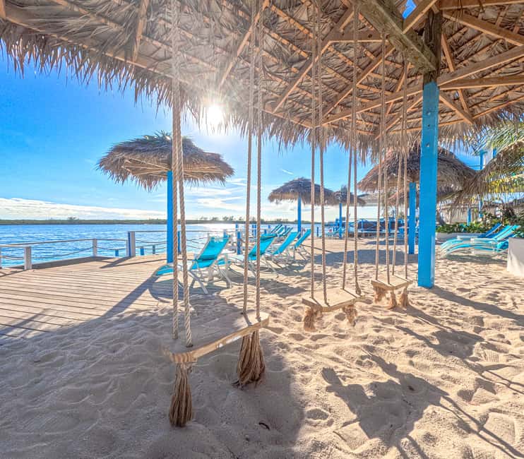 Nassau: Sun Cay Day Trip, Snorkel, Iguana Encounter, & Lunch - Leaving Nassau by boat