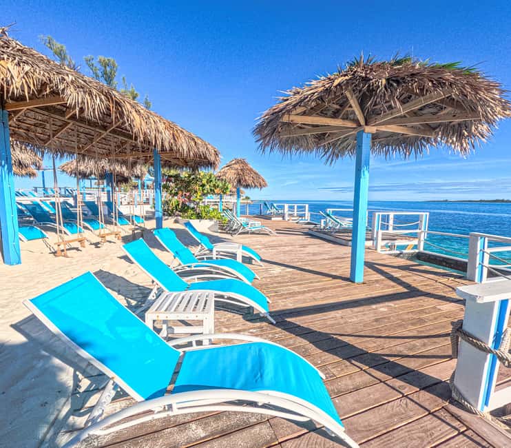 Nassau: Sun Cay Day Trip, Snorkel, Iguana Encounter, & Lunch - What Sun Cay feels like on arrival