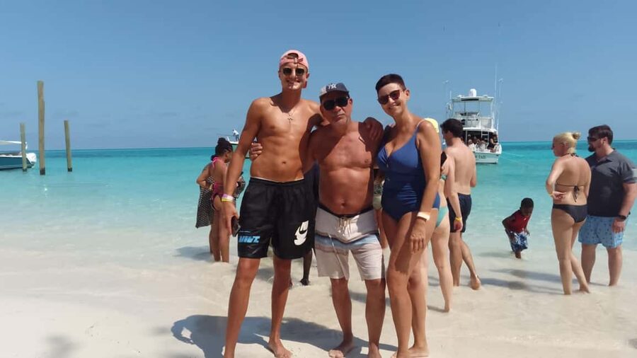 Nassau: Swimming with Pigs, Snorkeling, and Sightseeing Tour - Paradise Island views and a working boat route