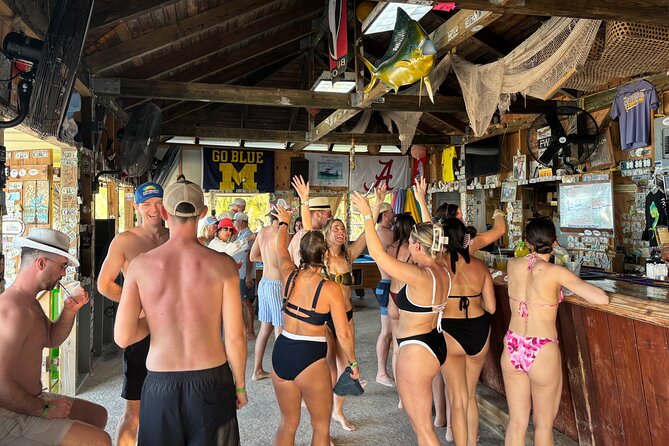 Rose Island Boat Party, Beach Getaway & Floating Bar - Drinks, music, and the crew