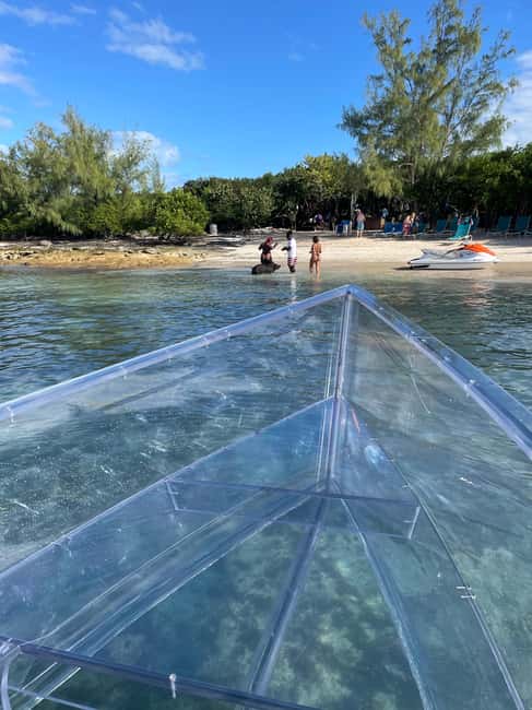 The Clear Boat Experience Bahamas drinks and snacks included - Looking through the clear boat around Nassau Harbor