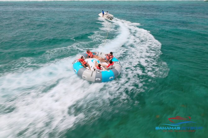 The Ultimate Bahamian Beach Day: Pigs, Jet Ski, Snorkeling & More - Snorkeling, kayaks, and the calmer side of Mansa Bay